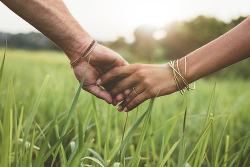 Hands Holding Building Trust